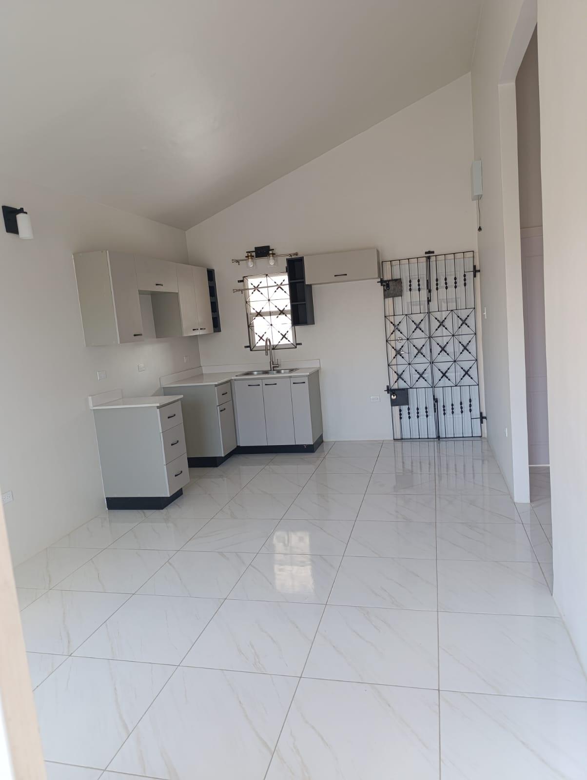 House For Rent: PHOENIX PARK VILLAGE 2, Spanish Town | $120,000 photo 6