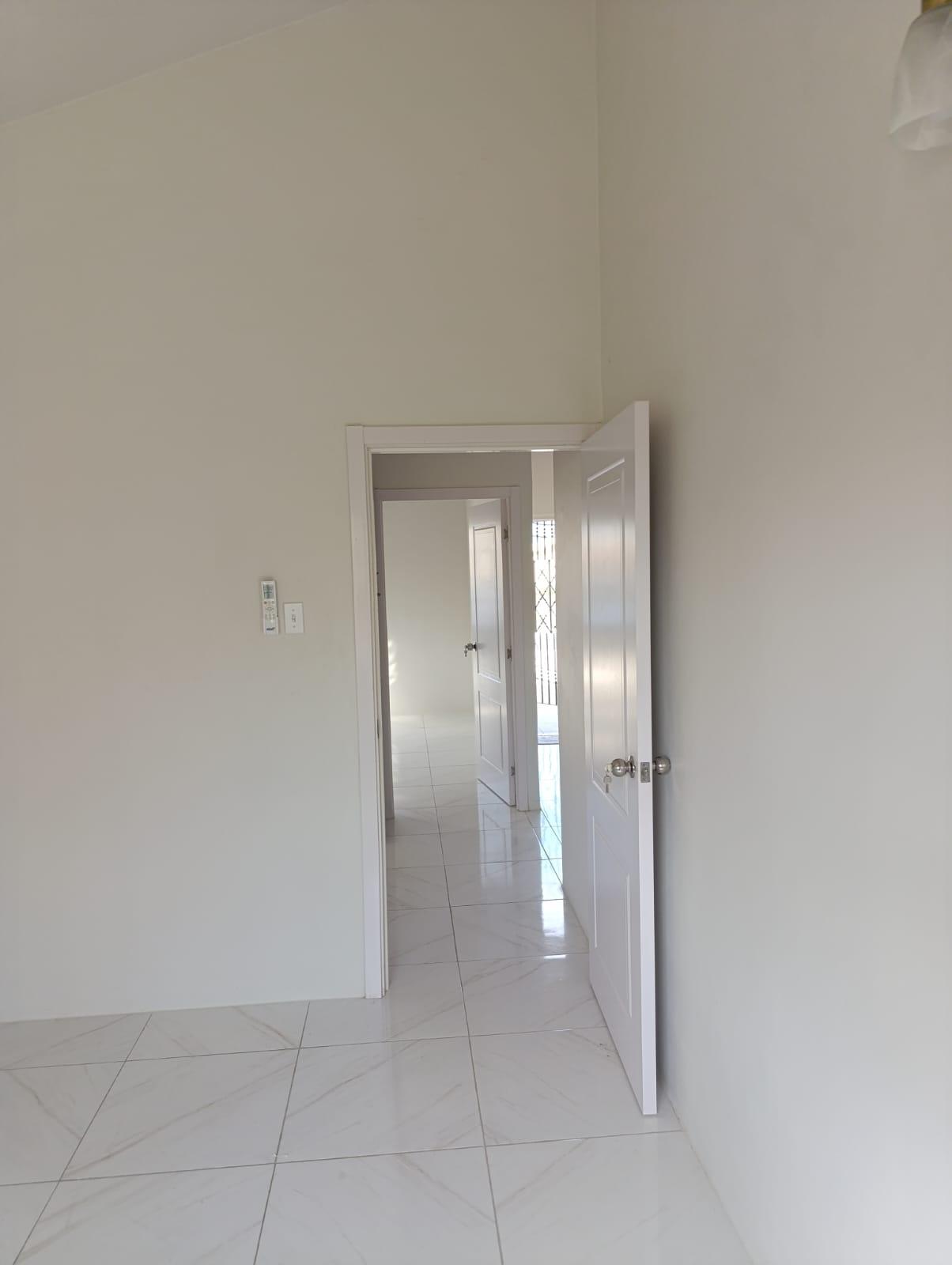 House For Rent: PHOENIX PARK VILLAGE 2, Spanish Town | $120,000 photo 8