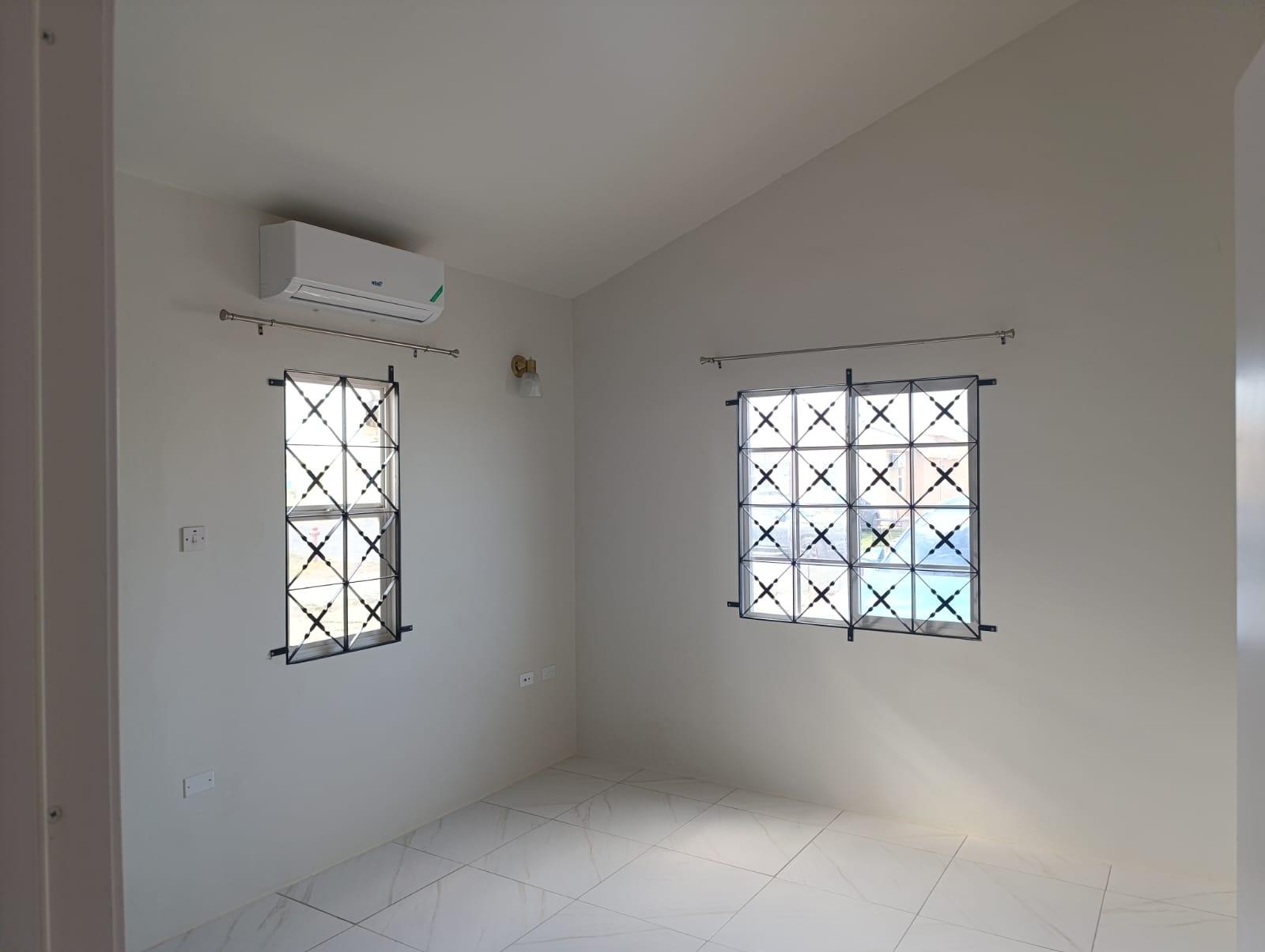 House For Rent: PHOENIX PARK VILLAGE 2, Spanish Town | $120,000 photo 9