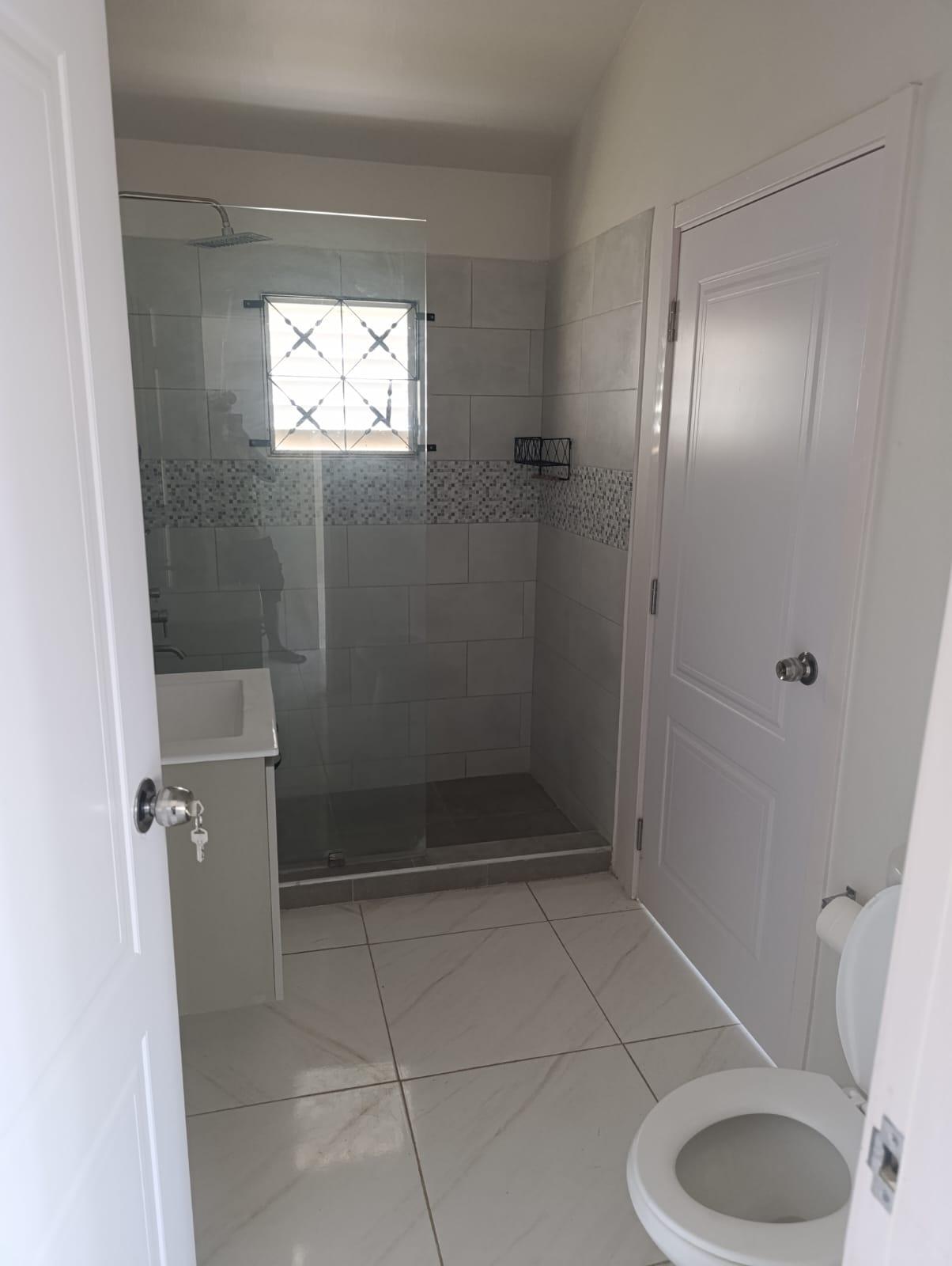 House For Rent: PHOENIX PARK VILLAGE 2, Spanish Town | $120,000 photo 12