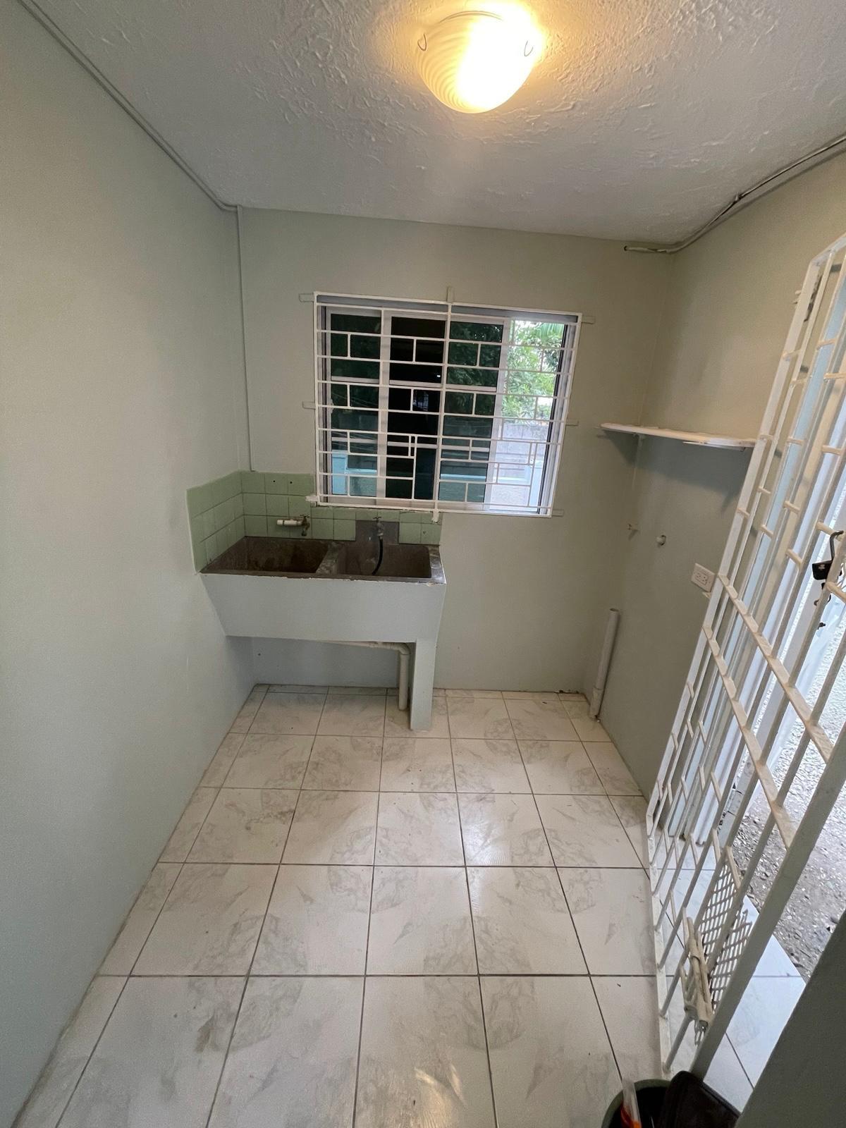 Townhouse For Rent: PLASTIC WAY, Kingston 20 | $160,000 photo 3