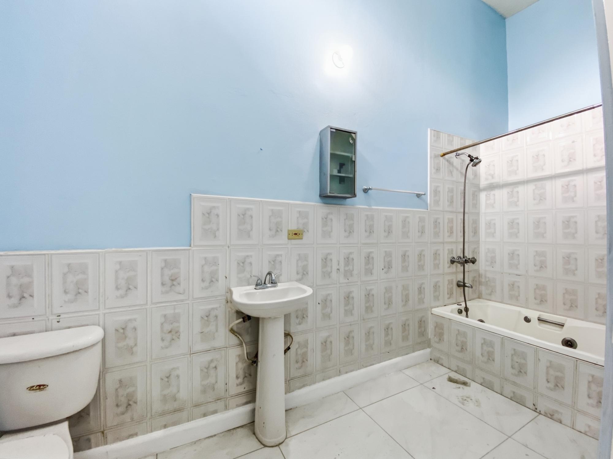 Townhouse For Rent: PINES OF KARACHI, Kingston 7 | $190,000 photo 14