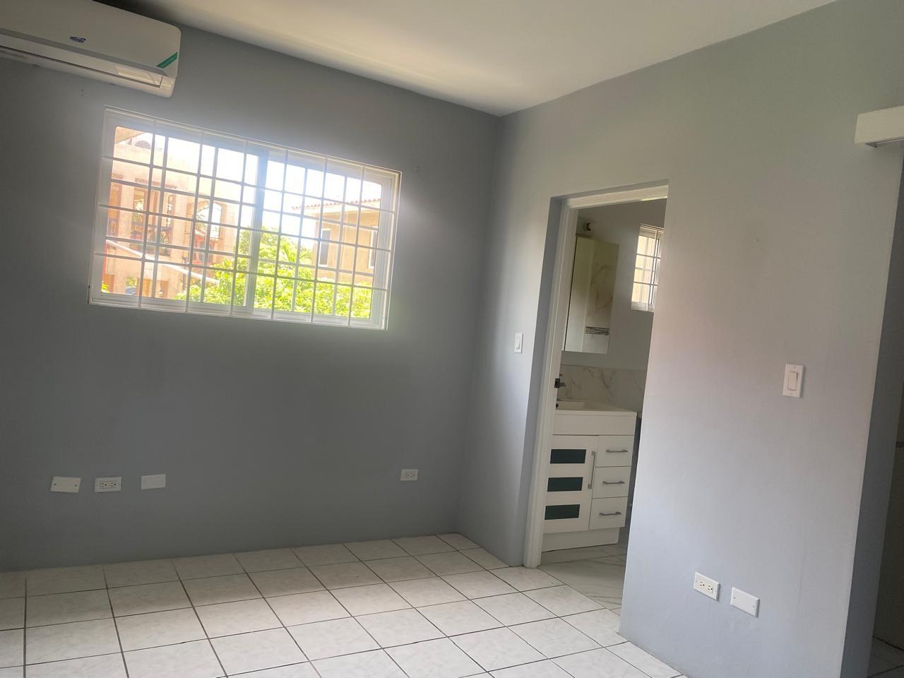 Townhouse For Rent: BAYSHORE, IRONSHORE, Ironshore | $1,800 photo 9