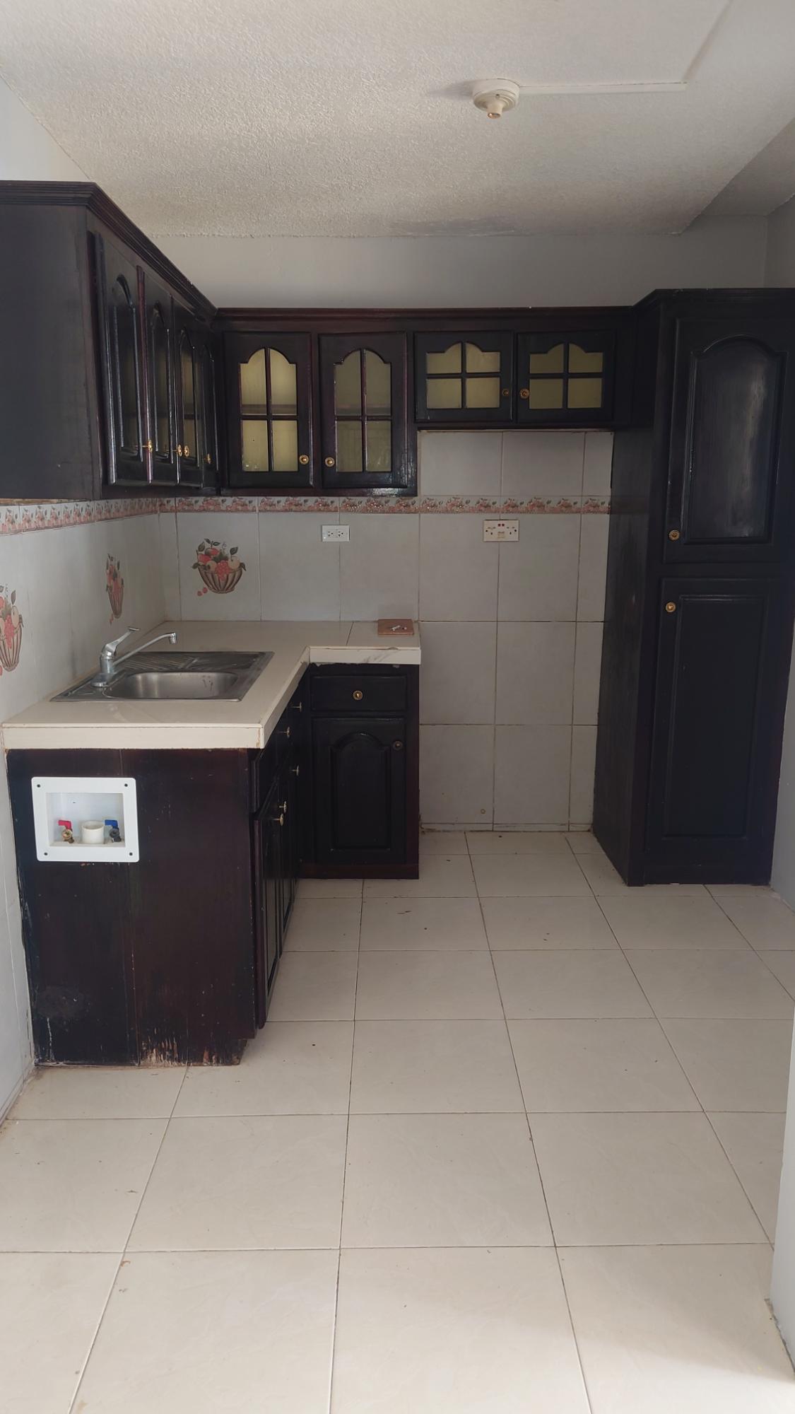House For Rent: KENT AVENUE, Ensom City | $75,000 photo 4