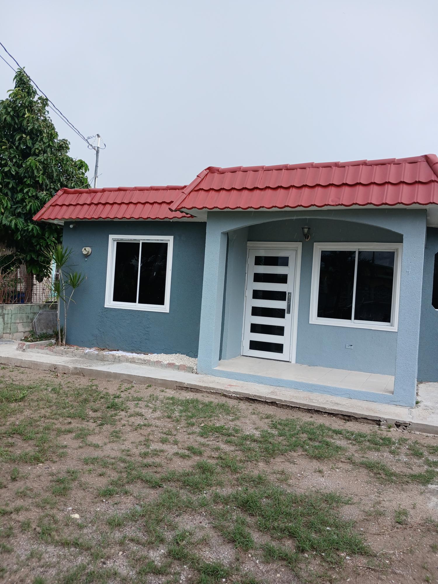 House For Sale: WEDGEWOOD GARDENS, SPANIS, Spanish Town | $2,700,000 photo 2